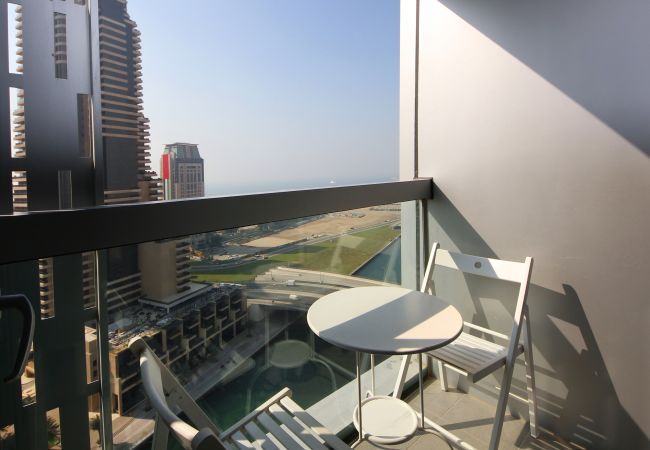 Enjoy the balcony views from this Cayan Tower Holiday Rental in Dubai